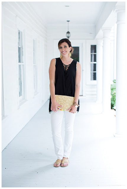 woman in top Black and White pants outfit