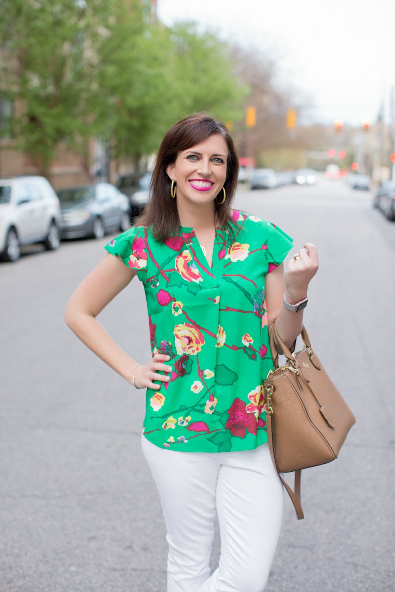 J.Crew Factory Floral Top featured by top US fashion blog I'm Fixin' To; Image of a woman wearing J. Crew Factory floral top, J. Crew high-waisted jeans, Steve Madden wedges, Tory Burch tote, Sheila Fajl hoops, David Yurman bangle and Moon & Lola Cheshire necklace.