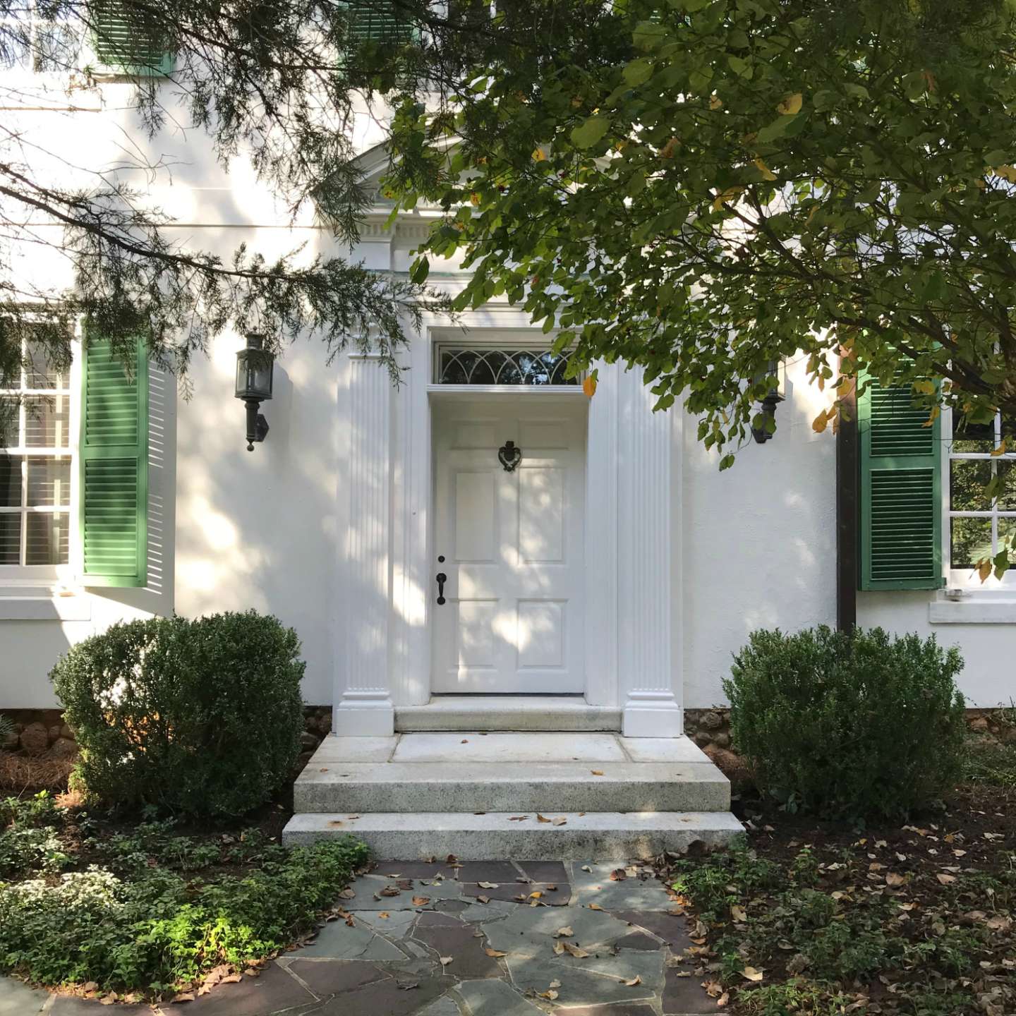 the exterior of a white home the exterior of a white home