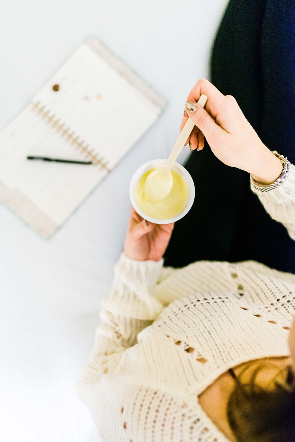 A Quick Dessert Idea that Will Satisfy your Cravings - I'm Fixin' To - @mbg0112 | Oikos, a quick desert idea that will satisfy your sweet cravings, featured by top US lifestyle blog, I'm Fixin To: image of a woman eating an Oikos yogurt