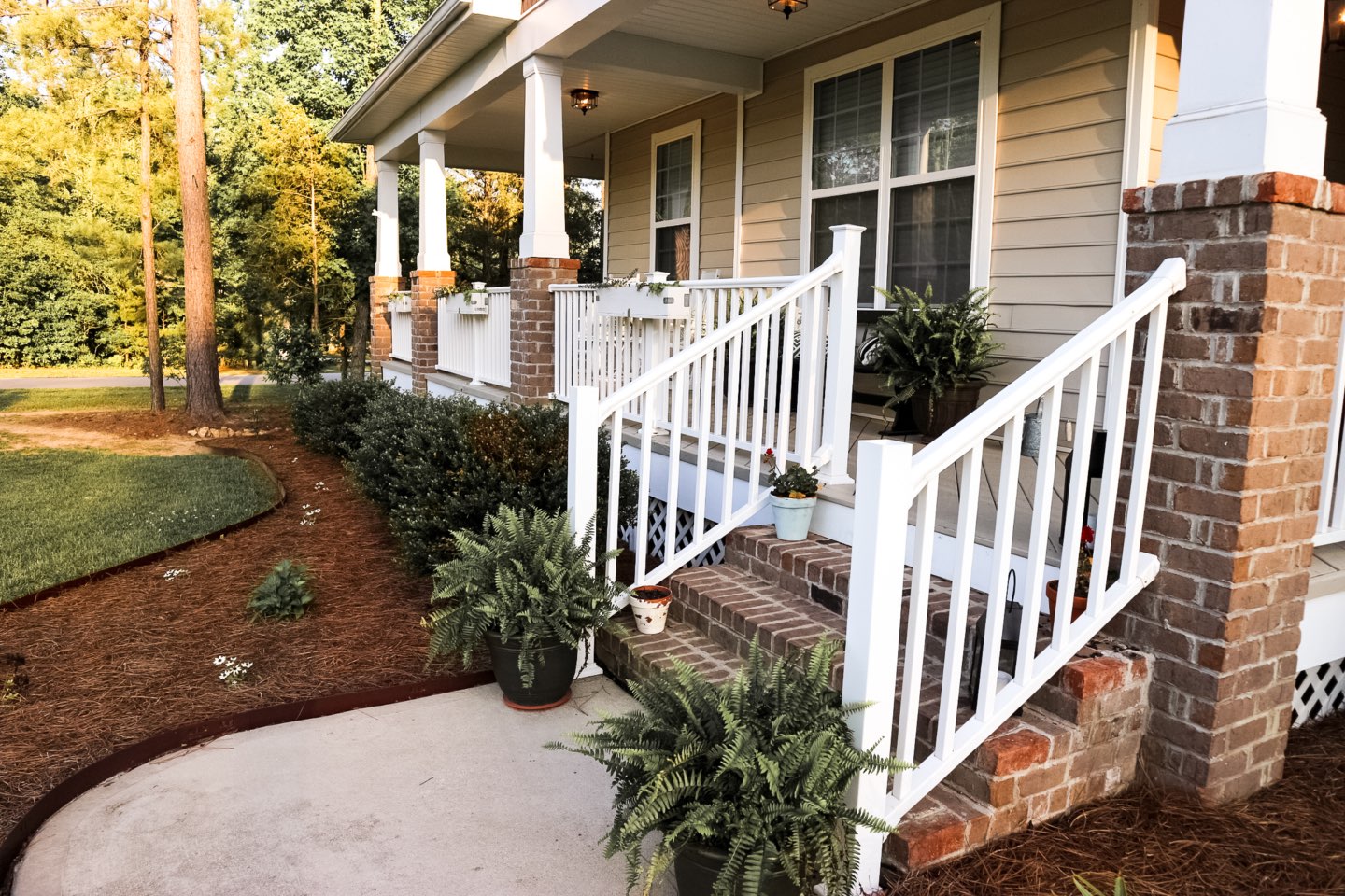 How to Update Your Front Porch Decor for the Season - I'm Fixin' To - @mbg0112 | Front Porch Decor for Spring featured by top US lifestyle blog, I'm Fixin' To: image of plants being planted