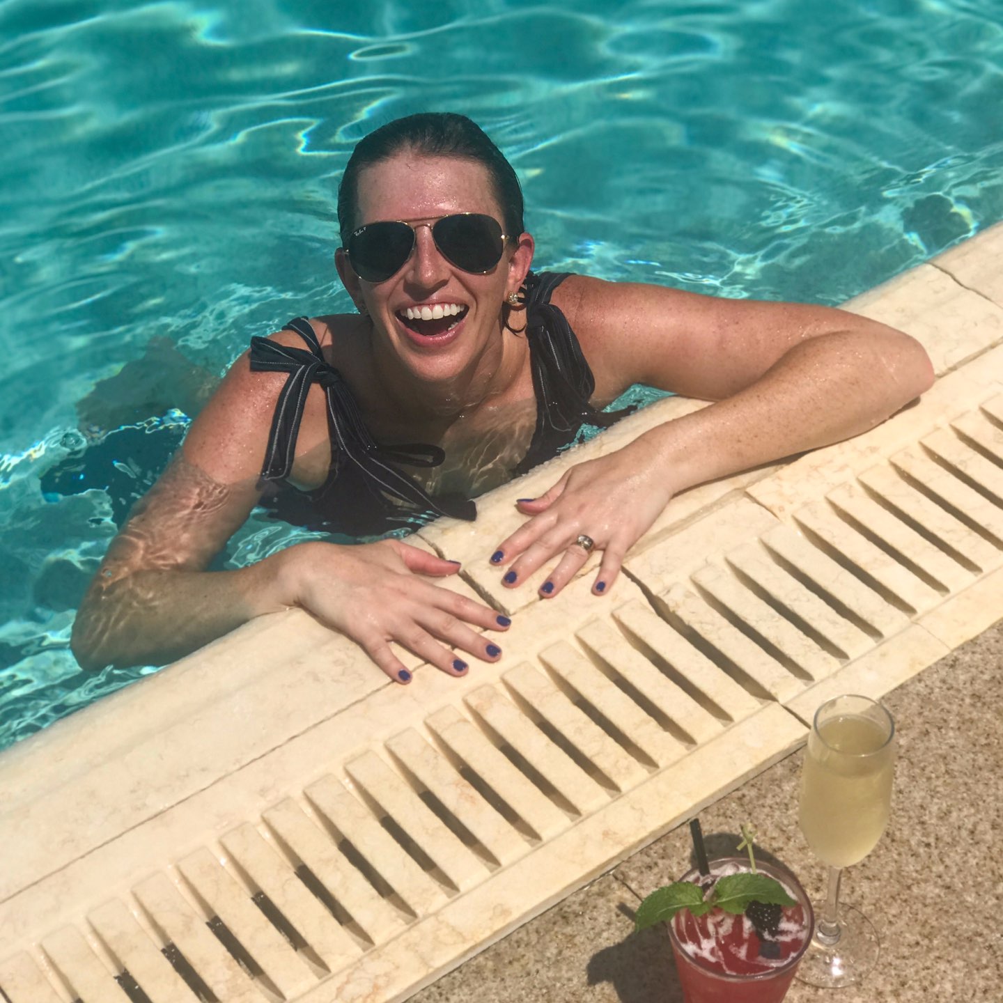 Welcome August + July 2019 Instagram Roundup - I'm Fixin' To - @mbg0112 | Welcome August + July 2019 Instagram Roundup by popular North Carolina life and style blog, I'm Fixin' To: image of woman swimming in the pool at the Umstead.