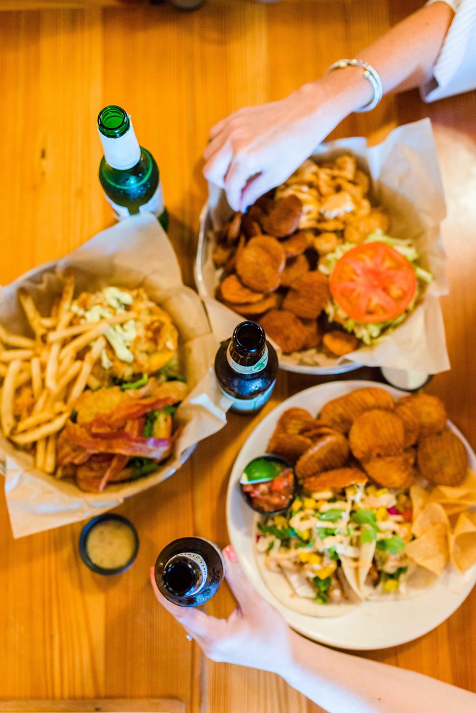 One Year Since Hurricane Florence in North Carolina and How to Help Ocracoke by popular North Carolina blog, I'm Fixin' To: image of plates of food at the Beach Shop and Grill.