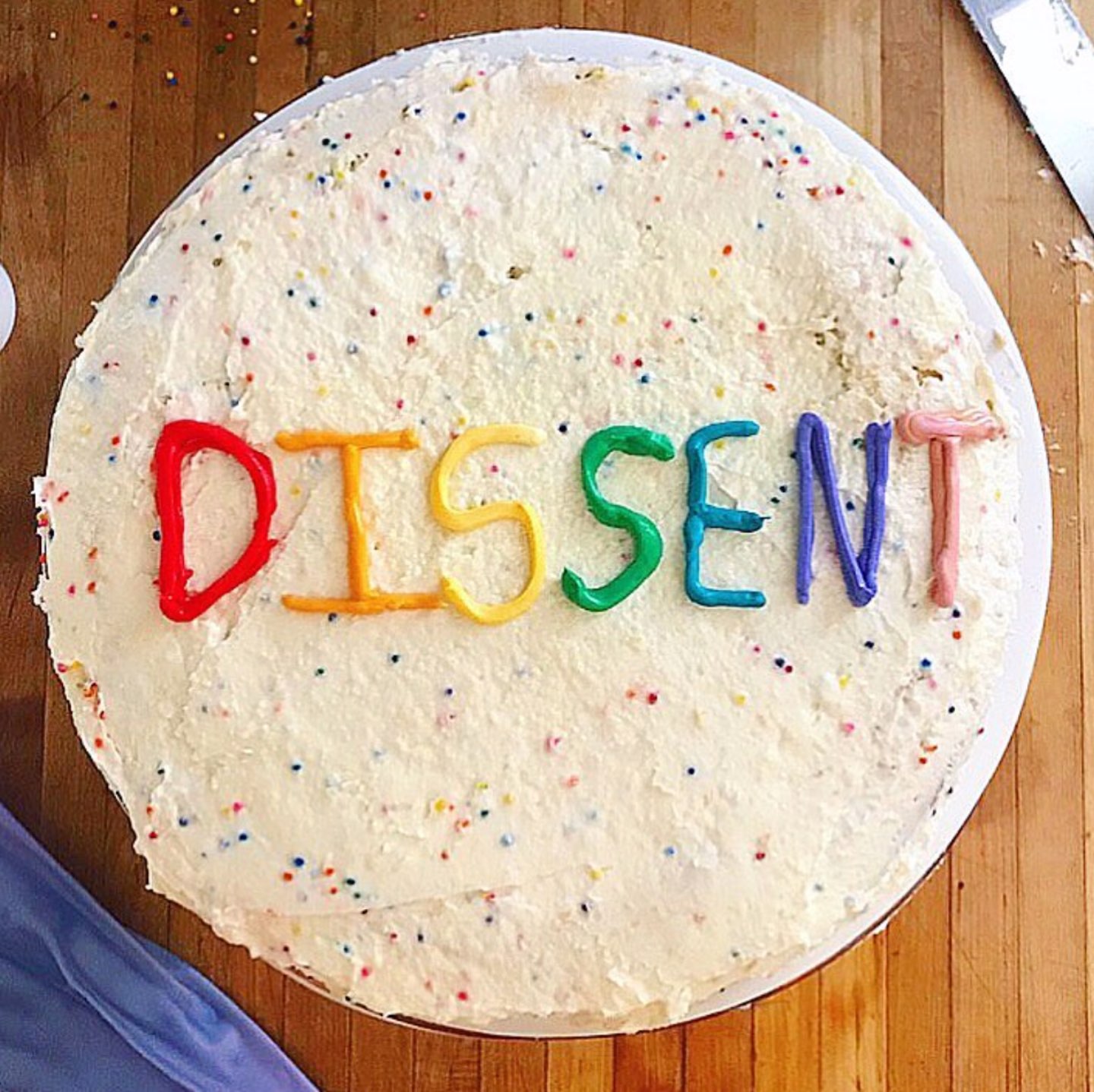 Top 12 Best Instagram Accounts to Follow - I'm Fixin' To - @mbg0112 | Top 12 Best Instagram Accounts to Follow by popular North Carolina lifestyle blog, I'm Fixin' To: image of a cake with the word ' Dissent' spelled out in frosting.