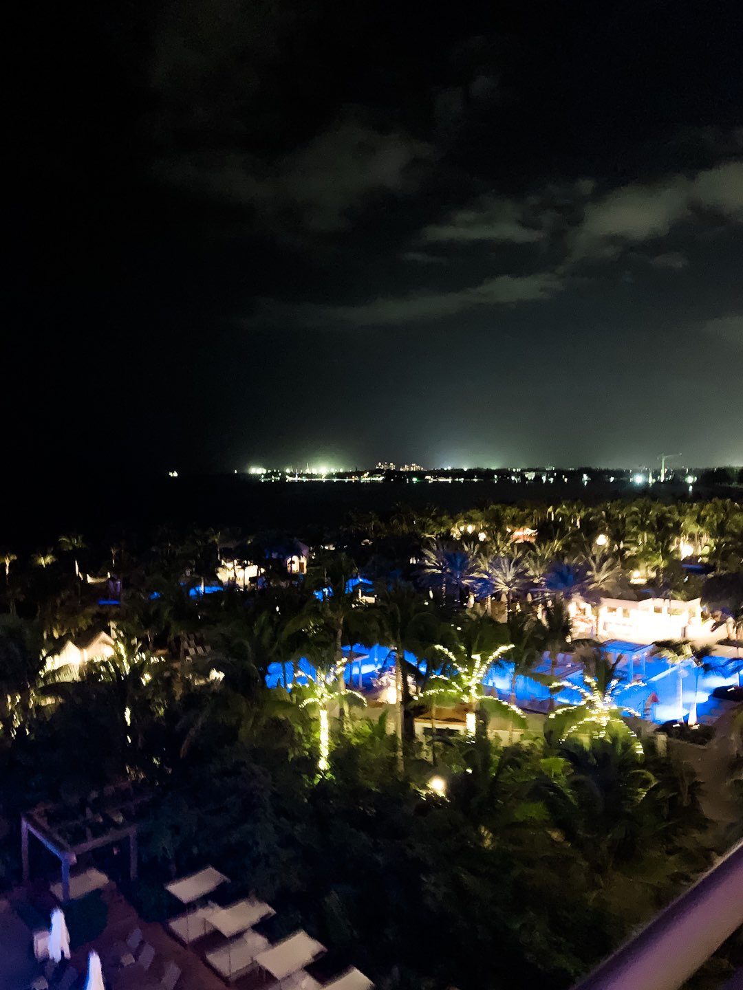 Warming Up in the Bahamas: the Best Things to Do at Baha Mar - I'm Fixin' To - @mbg0112 | Warming Up in the Bahamas: the Best Things to Do in Baha Mar by popular North Carolina travel blog, I'm Fixin' To: image of palm trees with white lights on them. 