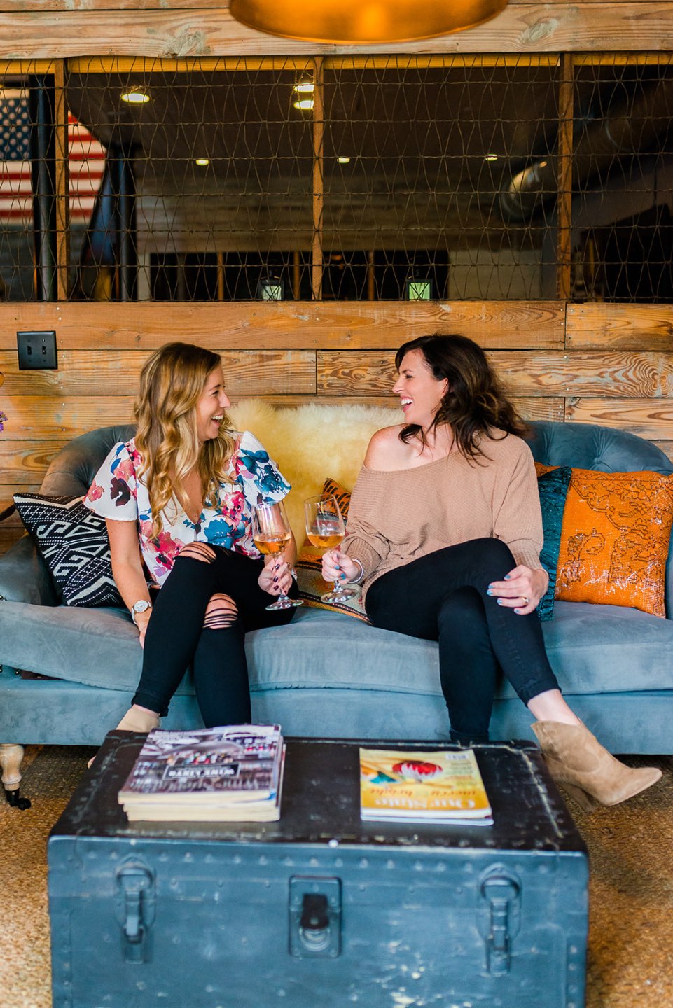 How to Set Healthy Boundaries with Friends: 8 Essential Tips - I'm Fixin' To - @mbg0112 | How to Set Healthy Boundaries with Friends: 8 Essential Tips by popular NC life and style blog, I'm Fixin' To: image of a woman sitting on a couch with a friend while they share a drink.