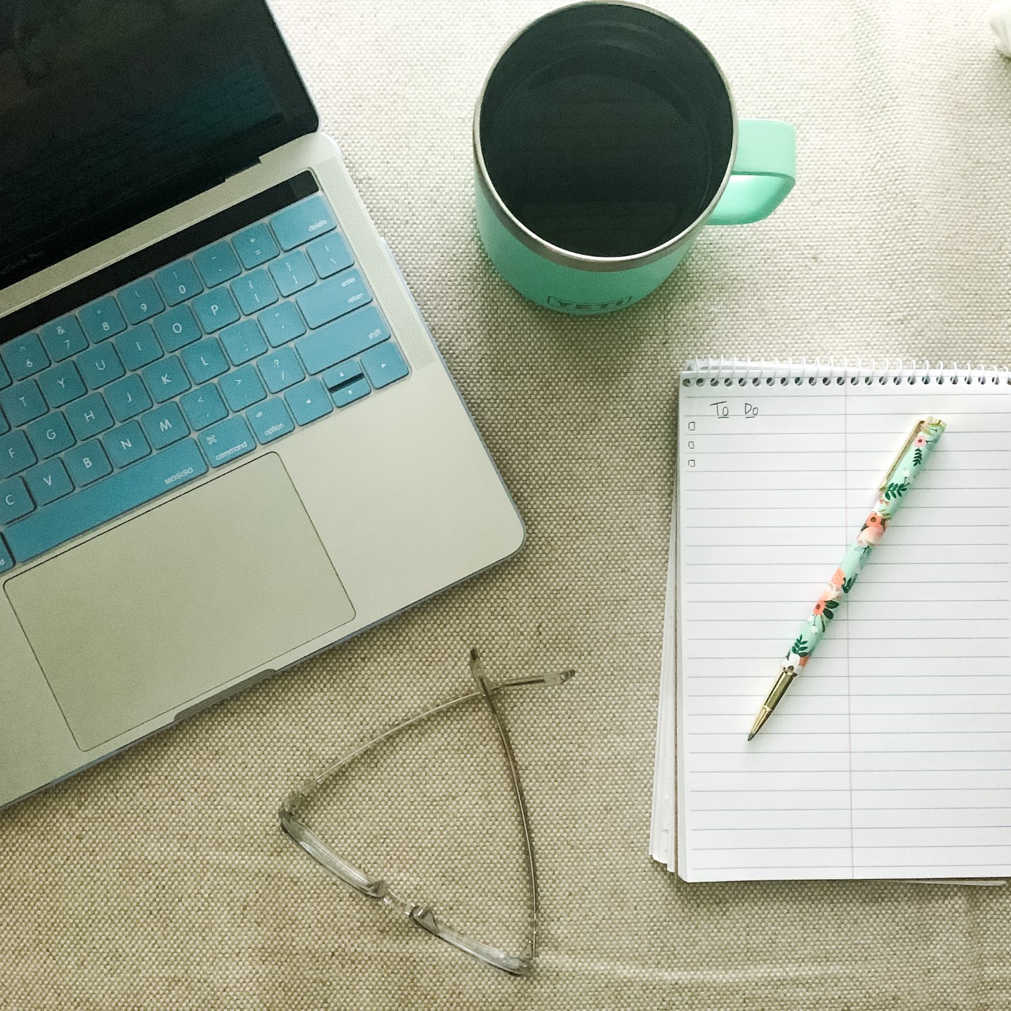 Amazon Favorites by popular NC life and style blog, I'm Fixin' To: image of a open laptop, notebook, Rifle Paper Co. pen, and a coffee mug.