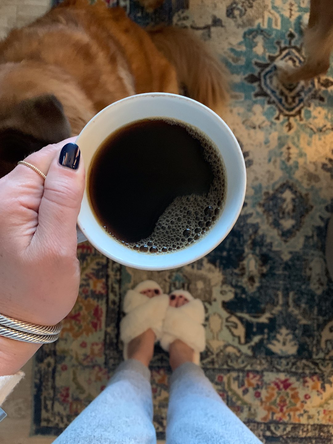 The Empowered Women Series: Three Tips for Handling Stress during COVID-19 with Bethany Hauch - I'm Fixin' To - @mbg0112 | Stress Management Tips by popular NC lifestyle blog, I'm Fixin' To: image of a woman wearing white fuzzy slippers and holding a mug of coffee. 