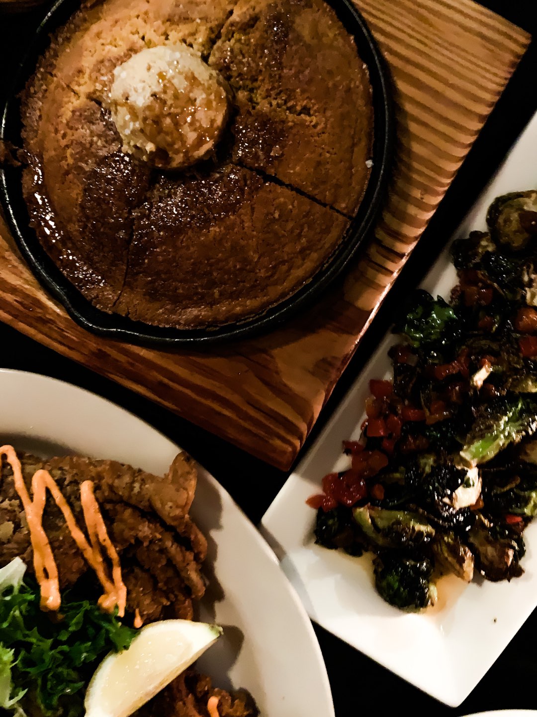 The 20 North Carolina Restaurants I Can't Wait to Visit after Quarantine - I'm Fixin' To - @mbg0112 | Best North Carolina Restaurants by popular N.C. blog, I'm Fixin' To: image of food at Acme Food and Beverage restaurant.
