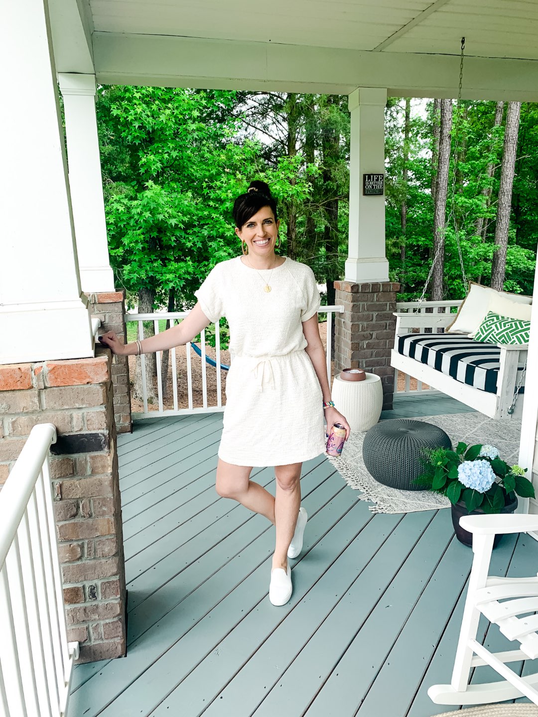 5 Stylish Teleworking Outfits for Women - I'm Fixin' To - @mbg0112 | Teleworking Outfits for Women by popular North Carolina fashion blog, I'm Fixin' To: image of a woman standing on her front porch and wearing a Loft Lou + Grey TWEEDKNIT DRAWSTRING DRESS and Rothy's shoes.