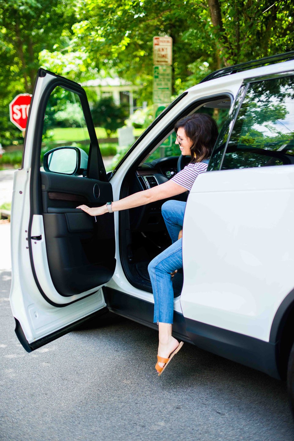 North Carolina Destinations by popular North Carolina blog, I'm Fixin' To: image of a woman getting out of a car. 