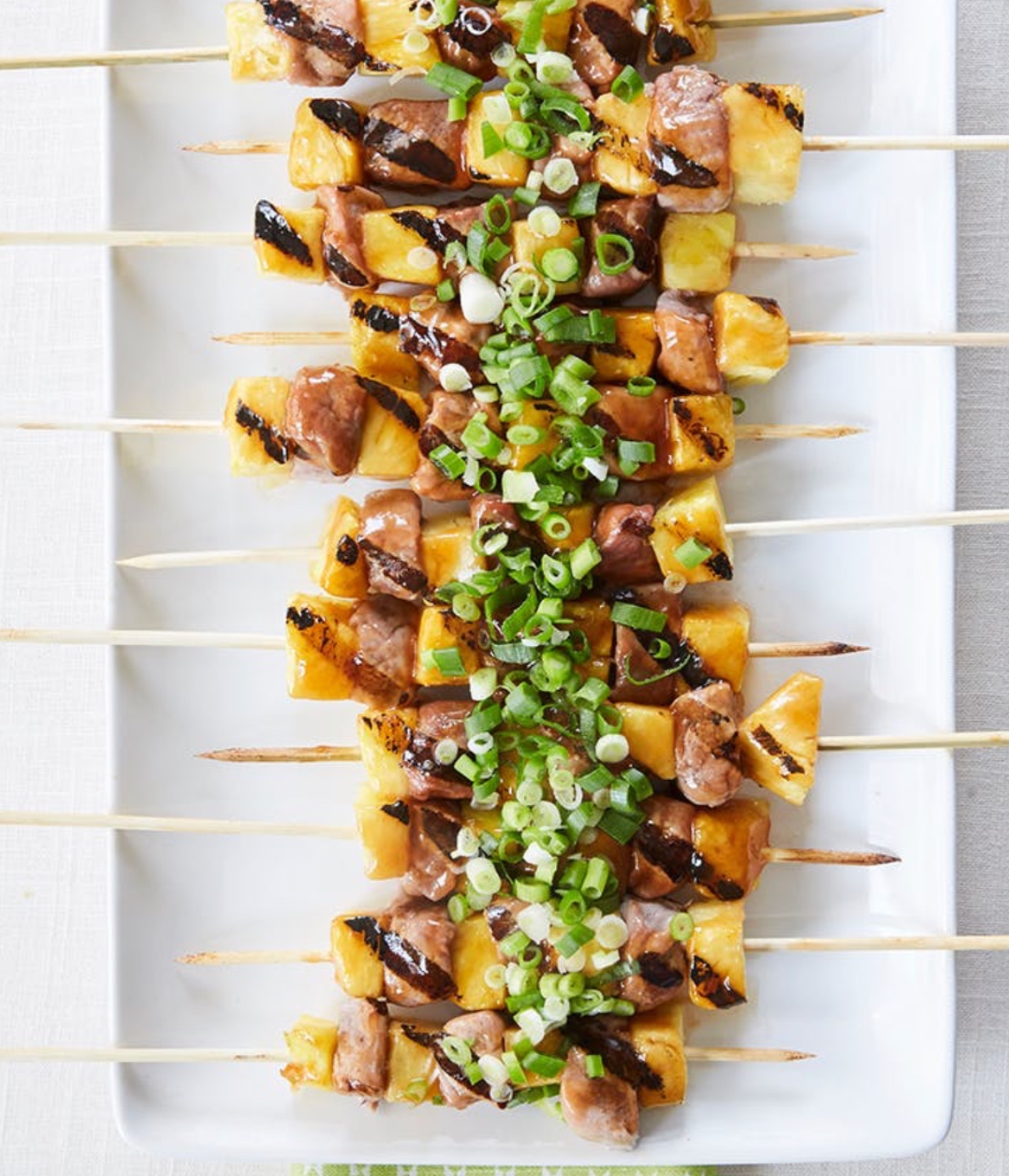 7 Recipes I Have Tried During Quarantine - I'm Fixin' To - @mbg0112 | Easy Recipes for Two by popular North Carolina lifestyle blog, I'm Fixin' To: image of sweet and sour pork skewers with pineapple.