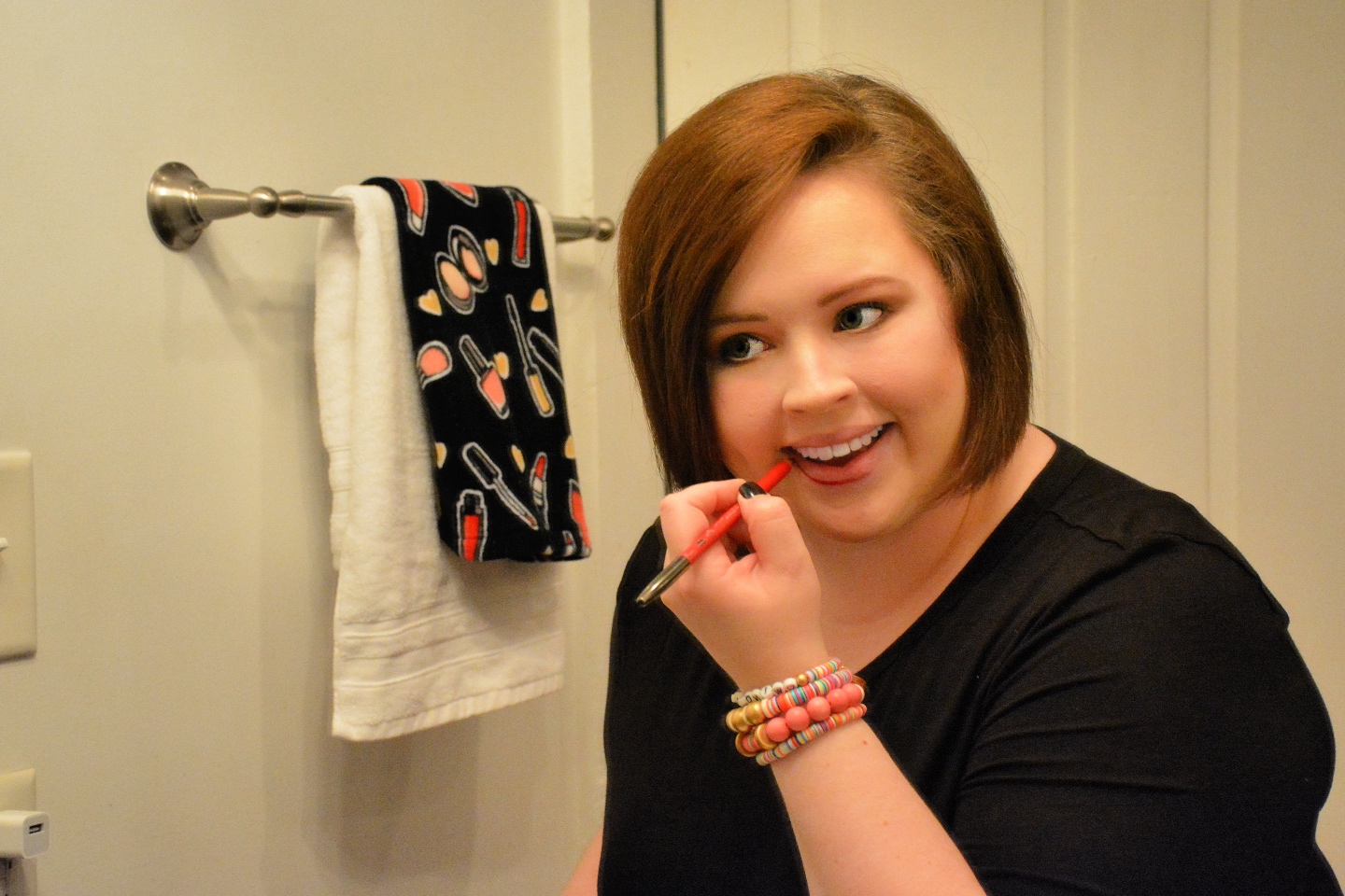 The Empowered Women Series: How to Rock a Red Lip with Hannah Dawson - I'm Fixin' To - @mbg0112 | Hannah Hardy by popular NC beauty blog, I'm Fixin' To: image of Hannah Hardy applying red lip liner. 