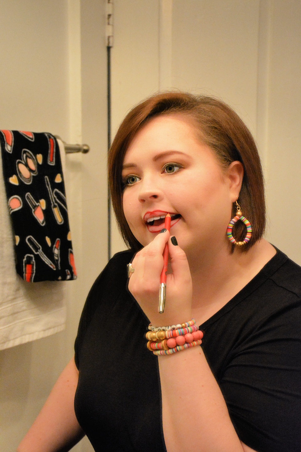 The Empowered Women Series: How to Rock a Red Lip with Hannah Dawson - I'm Fixin' To - @mbg0112 | Hannah Hardy by popular NC beauty blog, I'm Fixin' To: image of Hannah Hardy applying red lip liner. 