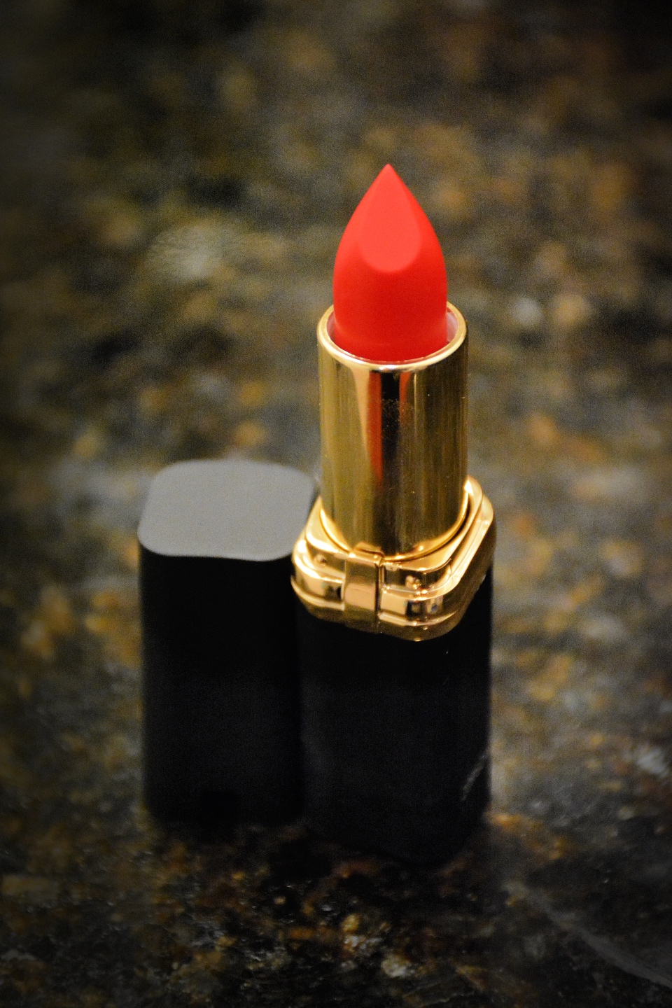 Hannah Hardy by popular NC beauty blog, I'm Fixin' To: image of a tube of red lipstick. 