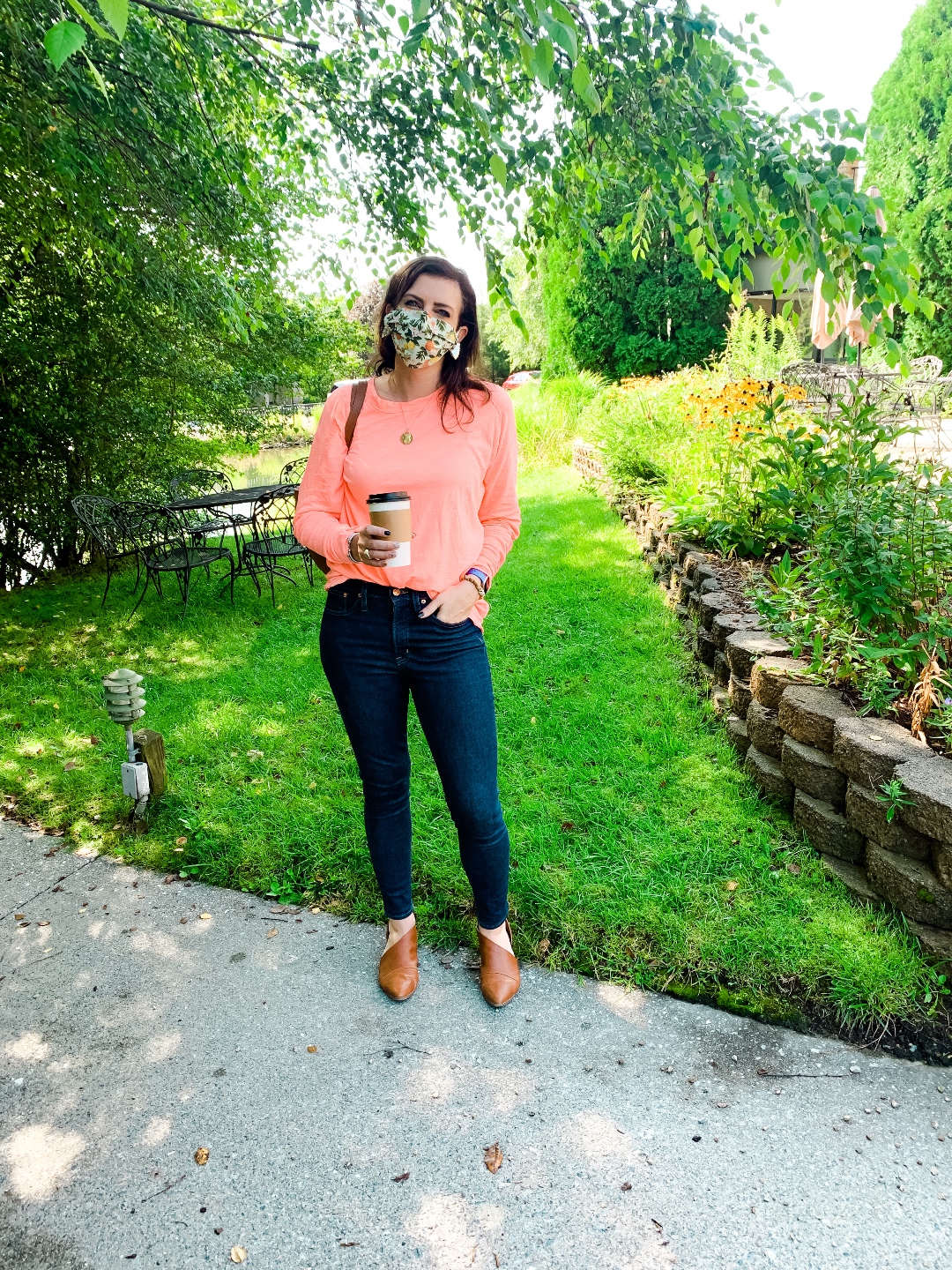 Nordstrom Anniversary Sale by popular N.C. fashion blog, I'm Fixin' To: image of a woman wearing a Nordstrom Free People Arden Extra Long Cotton Top, J. Crew skinny jeans, and Target mules.