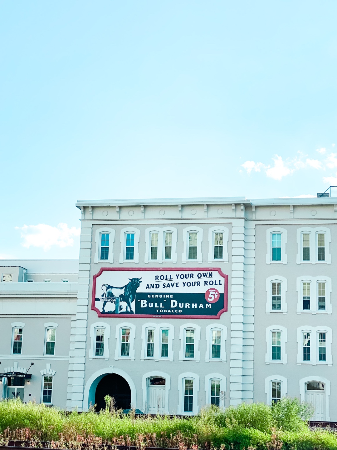 Date Night at the The Streetery in Downtown Durham - I'm Fixin' To - @mbg0112 | The Streetery in Downtown Durham by popular N.C. blog, I'm Fixin' To: image of the Bull Durham tobacco building. 