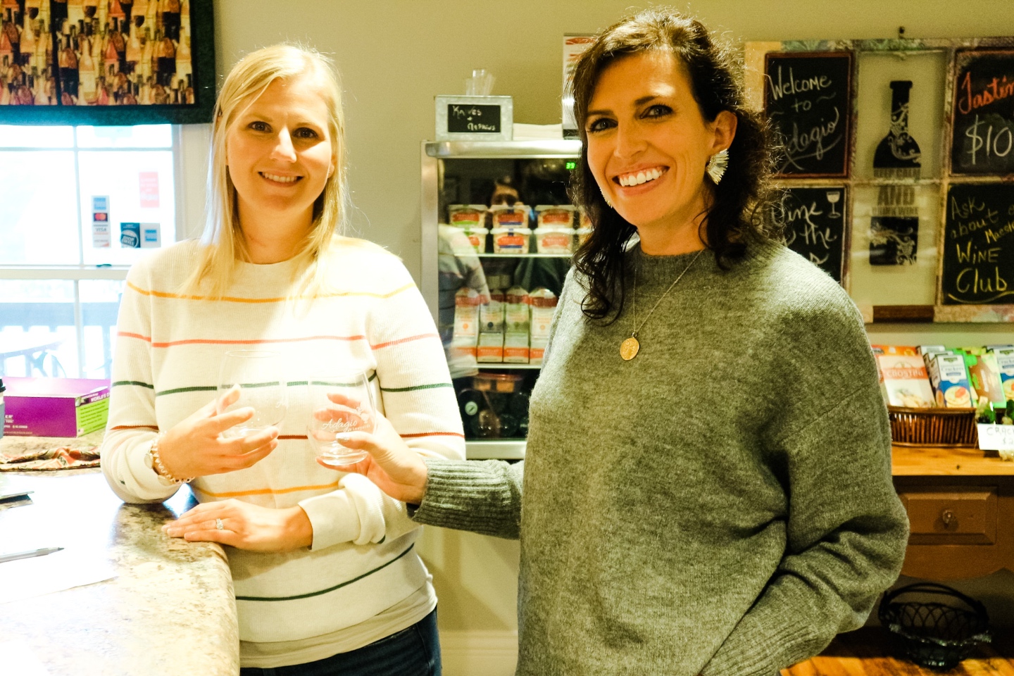 Western NC Wineries: 6 Wineries to Visit During your Next Girls' Weekend - I'm Fixin' To - @mbg0112 |Western NC Wineries by popular NC blog, I'm Fixin' To: image of two women at Adagio vineyards. 