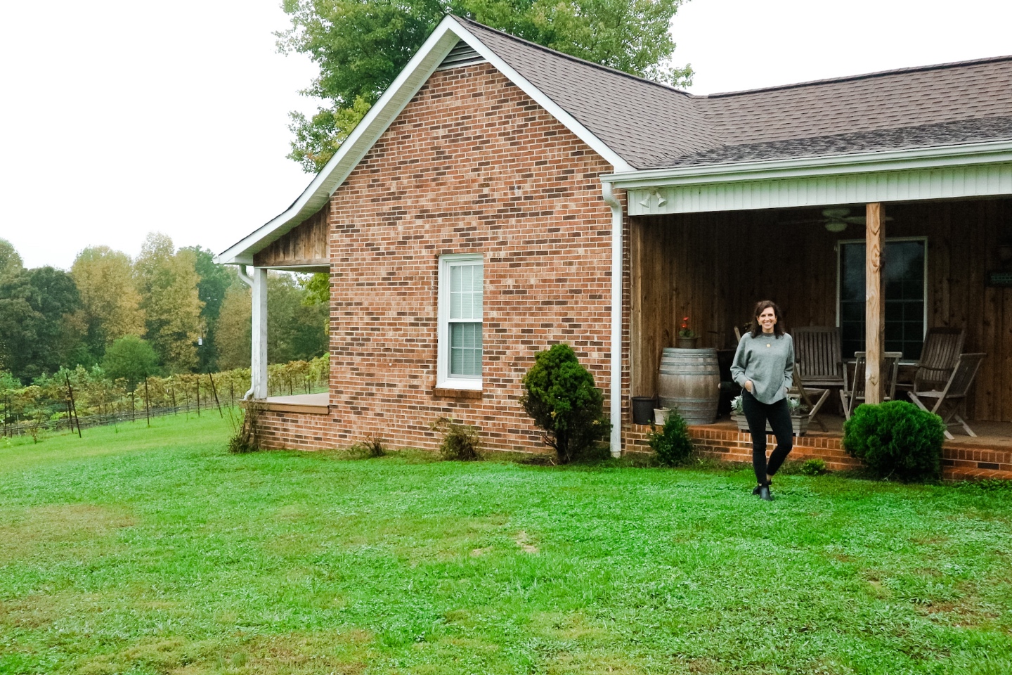 Western NC Wineries: 6 Wineries to Visit During your Next Girls' Weekend - I'm Fixin' To - @mbg0112 |Western NC Wineries by popular NC blog, I'm Fixin' To: image of a woman at Carolina Heritage vineyard and winery. 