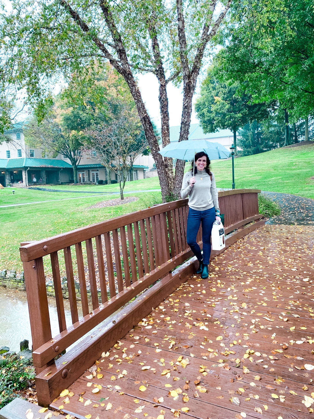 Western NC Wineries: 6 Wineries to Visit During your Next Girls' Weekend - I'm Fixin' To - @mbg0112 |Western NC Wineries by popular NC blog, I'm Fixin' To: image of a woman standing outside at Shelton Vineyards. 