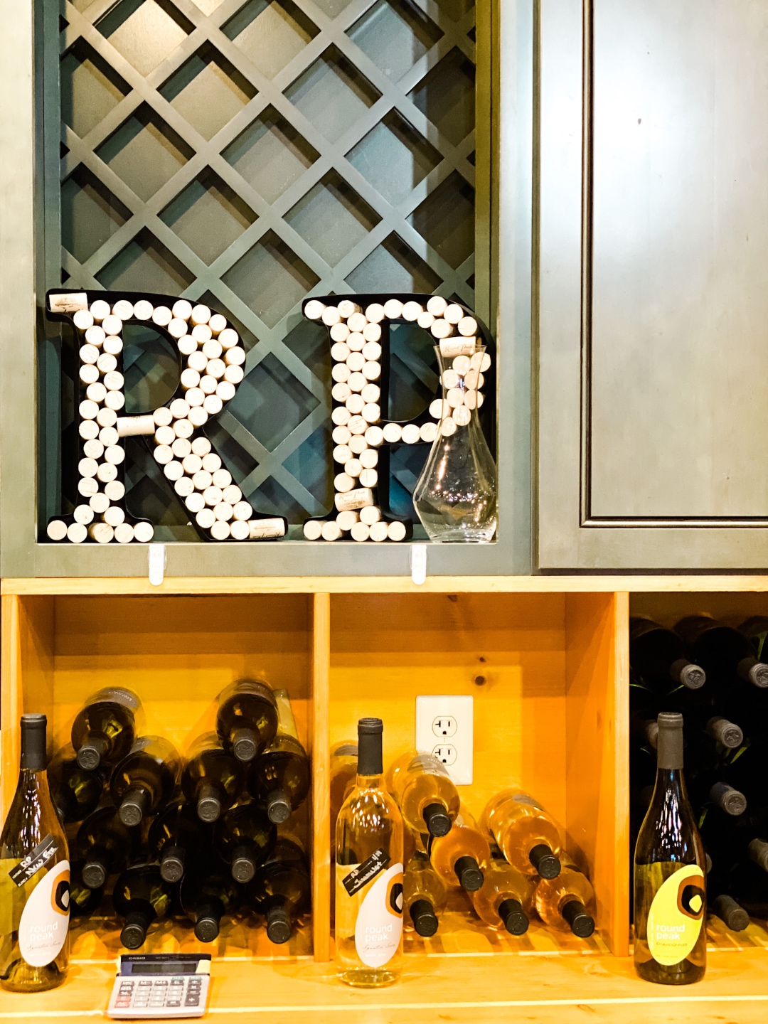 Western NC Wineries: 6 Wineries to Visit During your Next Girls' Weekend - I'm Fixin' To - @mbg0112 |Western NC Wineries by popular NC blog, I'm Fixin' To: image of bottle of wine at Round Peak Vineyards. 
