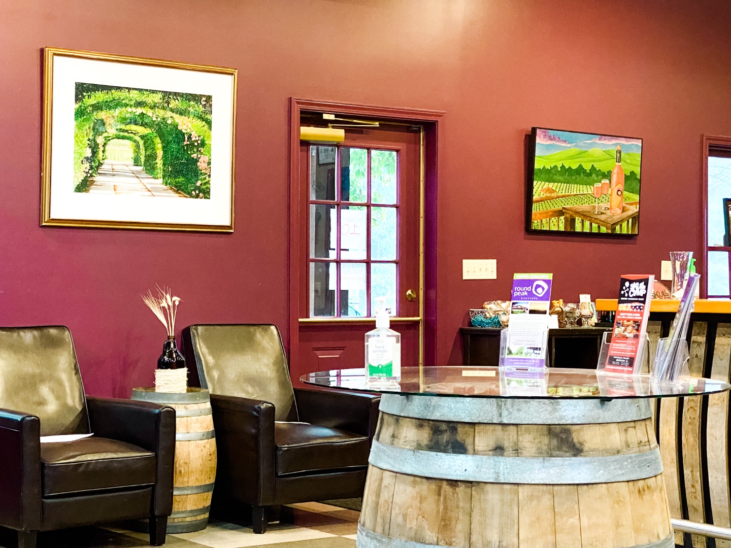 Western NC Wineries: 6 Wineries to Visit During your Next Girls' Weekend - I'm Fixin' To - @mbg0112 |Western NC Wineries by popular NC blog, I'm Fixin' To: image of a wine tasting room at Round Peak Vineyards. 
