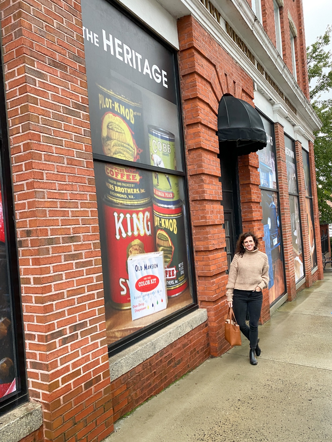 Western NC Wineries: 6 Wineries to Visit During your Next Girls' Weekend - I'm Fixin' To - @mbg0112 |Western NC Wineries by popular NC blog, I'm Fixin' To: image of a woman standing outside at the Old North State Winery. 