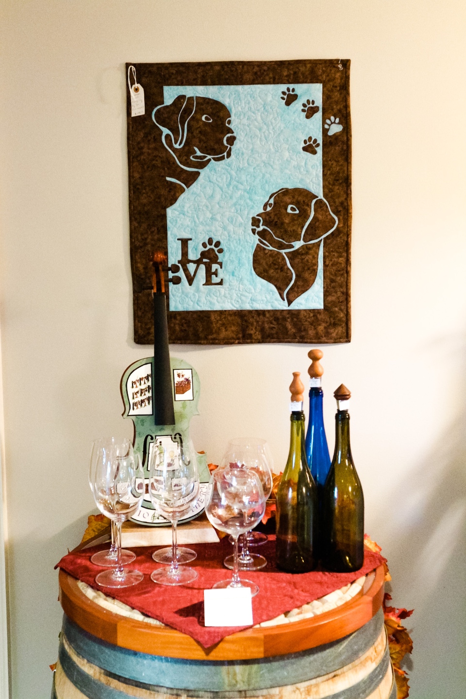 Western NC Wineries: 6 Wineries to Visit During your Next Girls' Weekend - I'm Fixin' To - @mbg0112 |Western NC Wineries by popular NC blog, I'm Fixin' To: image of vine glasses and wine bottles at Adagio Vineyards. 