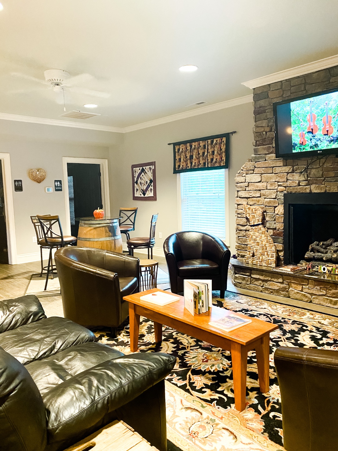 Western NC Wineries: 6 Wineries to Visit During your Next Girls' Weekend - I'm Fixin' To - @mbg0112 |Western NC Wineries by popular NC blog, I'm Fixin' To: image of a tasting room at Adagio vineyards. 
