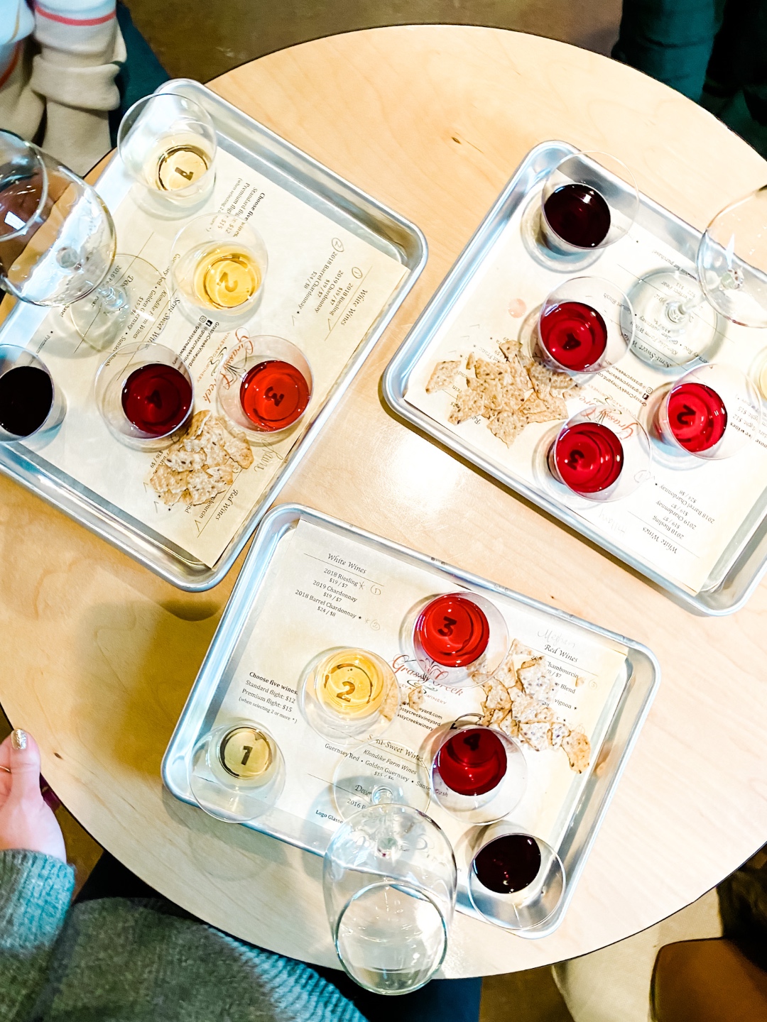 Western NC Wineries: 6 Wineries to Visit During your Next Girls' Weekend - I'm Fixin' To - @mbg0112 |Western NC Wineries by popular NC blog, I'm Fixin' To: image of a wine tasting tray at Grassy Creek Vineyard and Winery. 
