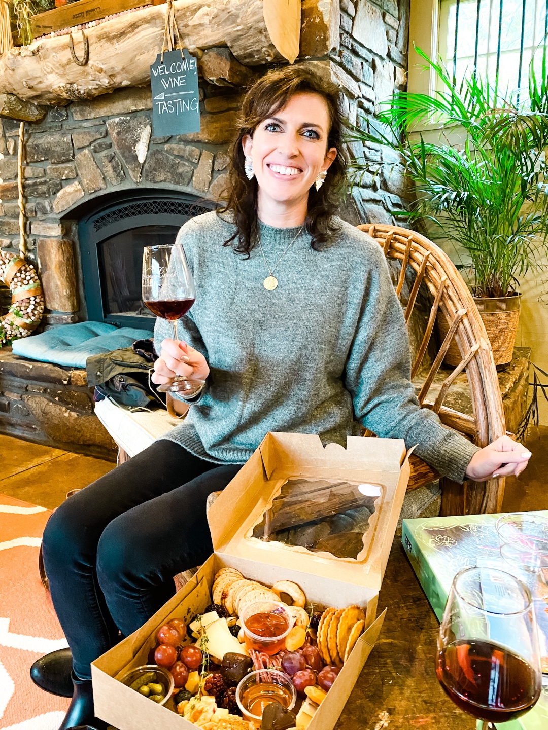 Western NC Wineries: 6 Wineries to Visit During your Next Girls' Weekend - I'm Fixin' To - @mbg0112 |Western NC Wineries by popular NC blog, I'm Fixin' To: image of a woman at Grassy Creek vineyard and Winery. 