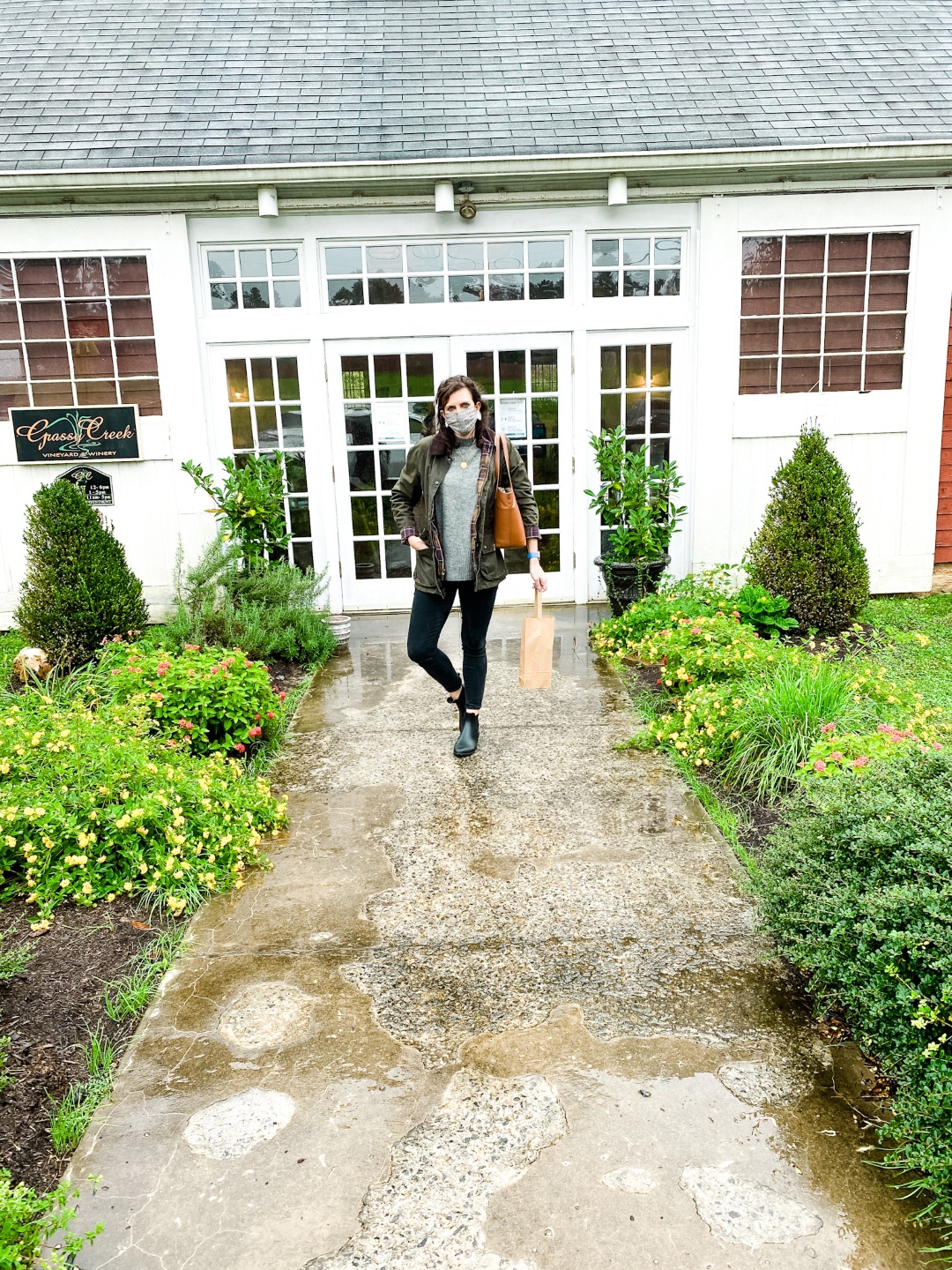 Western NC Wineries: 6 Wineries to Visit During your Next Girls' Weekend - I'm Fixin' To - @mbg0112 |Western NC Wineries by popular NC blog, I'm Fixin' To: image of a woman at Grassy Creek Vineyard and Winery. 