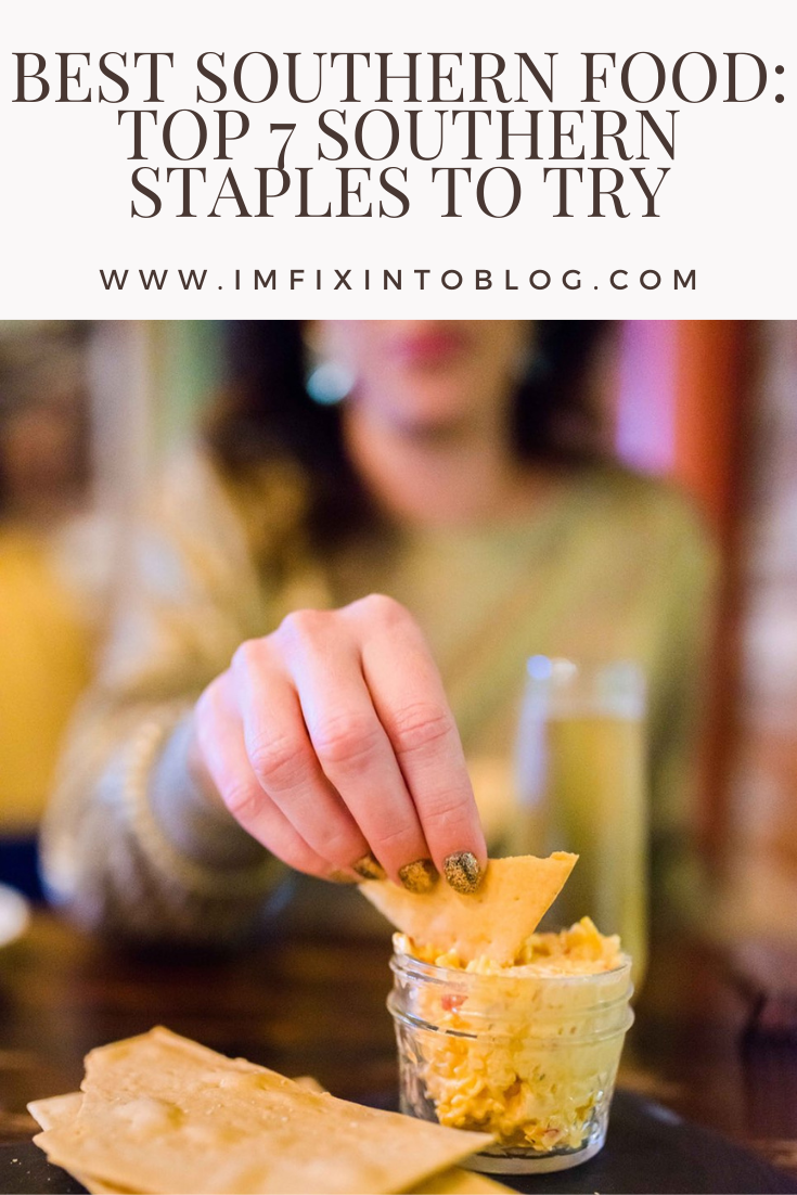 Best Southern Food: Top 7 Southern Staples to Try - I'm Fixin' To - @mbg0112 |Best Southern Food by popular N.C. lifestyle blog, I'm Fixin' To: Pinterest image of a woman dipping a chip into some pimento cheese. 