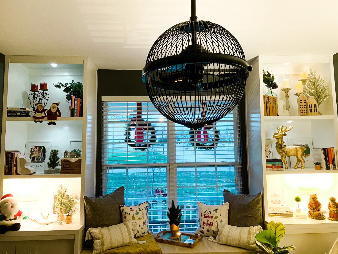 2020 Holiday Home Tour - I'm Fixin' To - @mbg0112 |Holiday Home Tour by popular NC life and style blog, I'm Fixin' To: image of bookcases decorated with Christmas decor. 