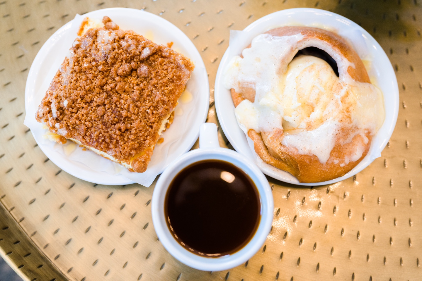 Places to Stay: The Colonial Inn in Hillsborough NC - I'm Fixin' To - @imfixintoblog |The Colonial Inn Hillsborough NC by popular NC travel blog, I'm Fixin' To: image of two pastries next to a cup of coffee.