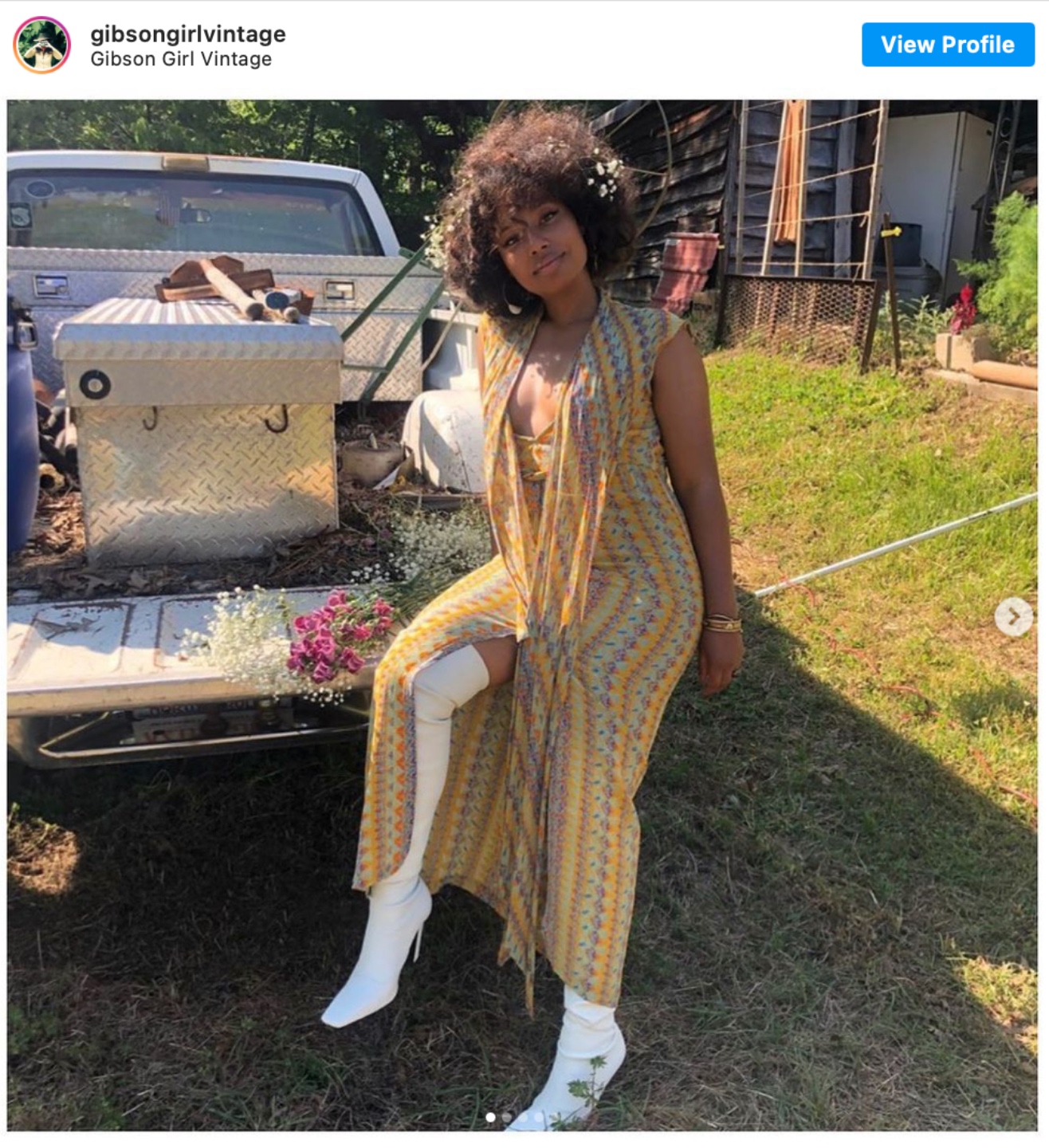 Durham Shopping: Top 11 Best Fashion Boutiques to visit After a Year of Quarantine - I'm Fixin' To - @imfixintoblog | Durham Shopping by popular NC lifestyle blog, I'm Fixin' To: image of a woman wearing white thigh high boots and a vintage outfit. 