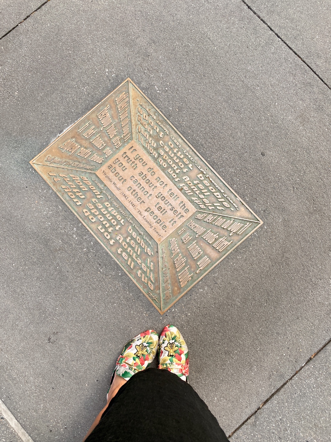 NYC Summer Weekend: Things to Do in NYC in the Summer - I'm Fixin' To - @imfixintoblog | NYC Summer Weekend by popular NC travel blog, I'm Fixin' To: image of a metal sign embedded in a sidewalk. 