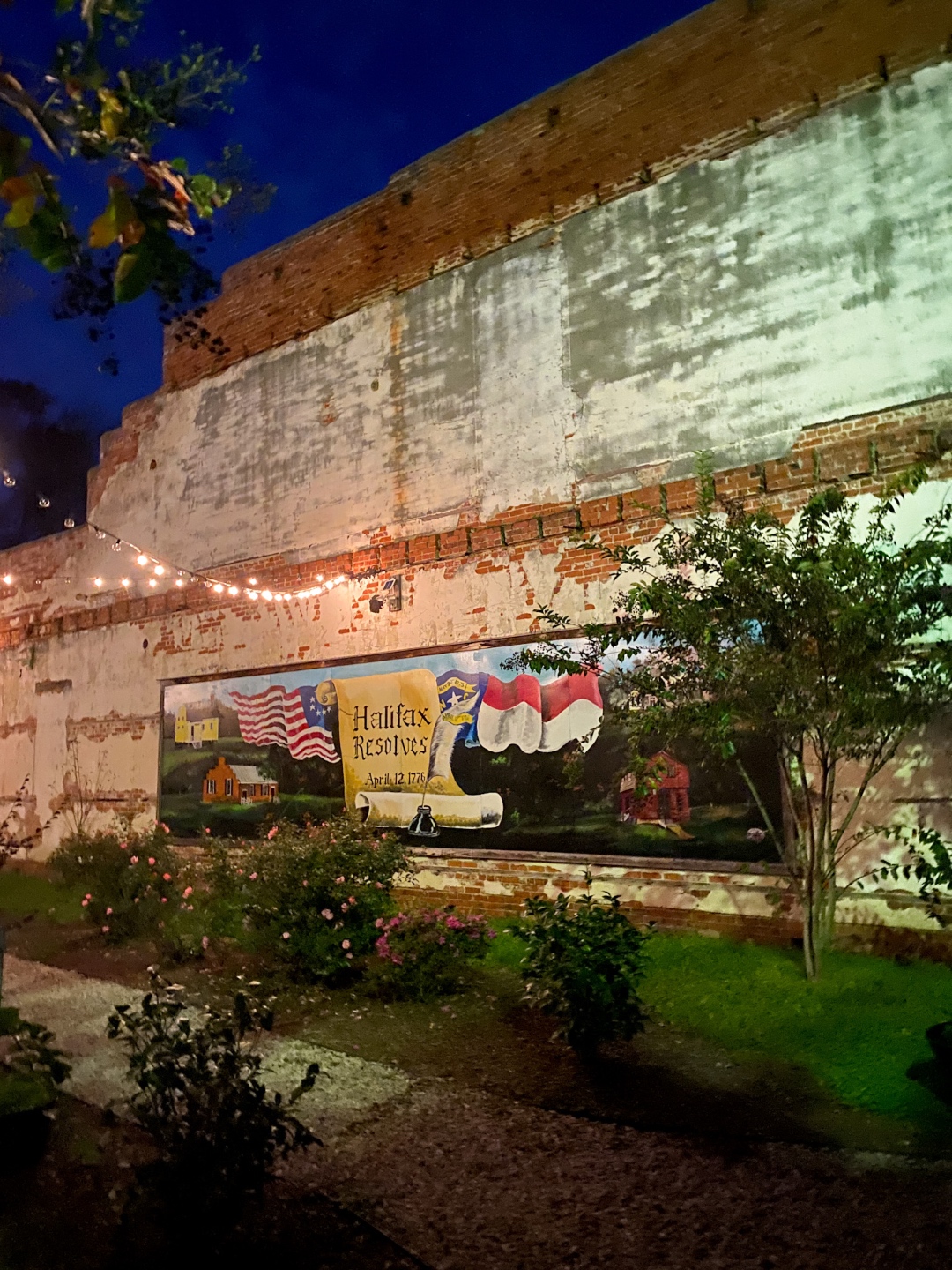 An Update on My North Carolina 100 County Tour - I'm Fixin' To - @imfixintoblog | Things to do in North Carolina by popular NC travel blog, I'm Fixin' To: image of a Halifax wall mural. 
