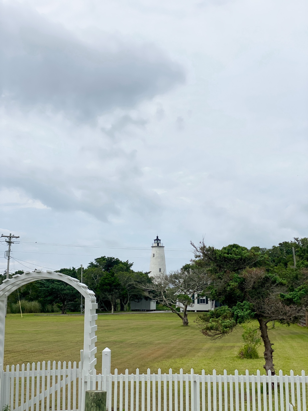 An Update on My North Carolina 100 County Tour - I'm Fixin' To - @imfixintoblog | Things to do in North Carolina by popular NC travel blog, I'm Fixin' To: image of a white lighthouse. 