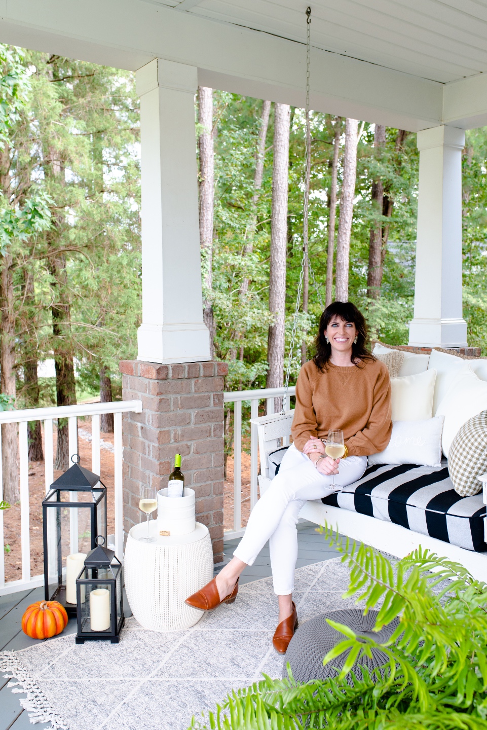 woman sitting on the porch