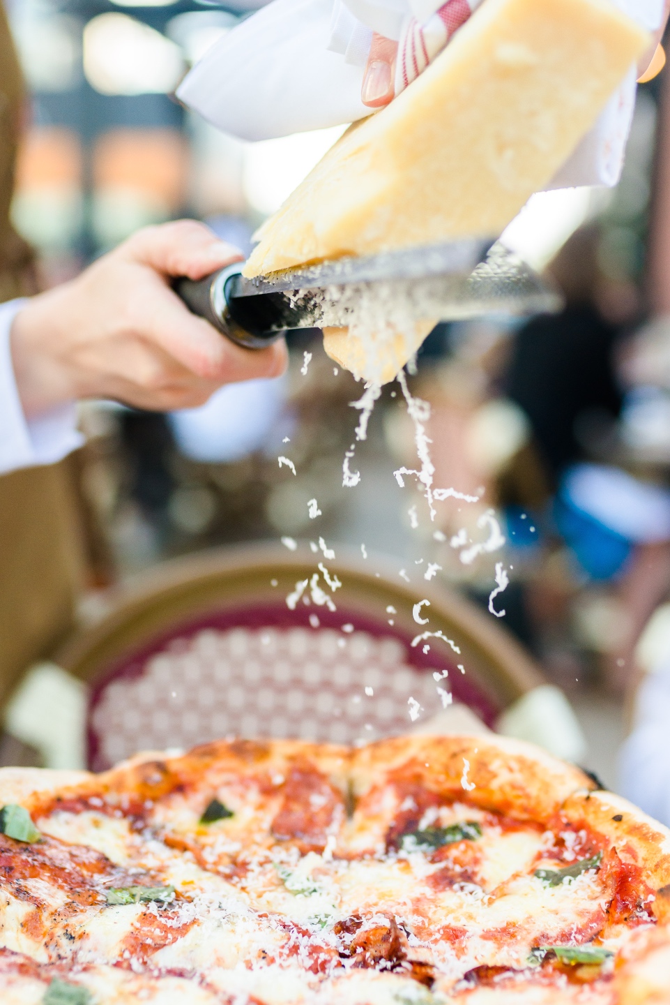 shredding of cheese in pizza 