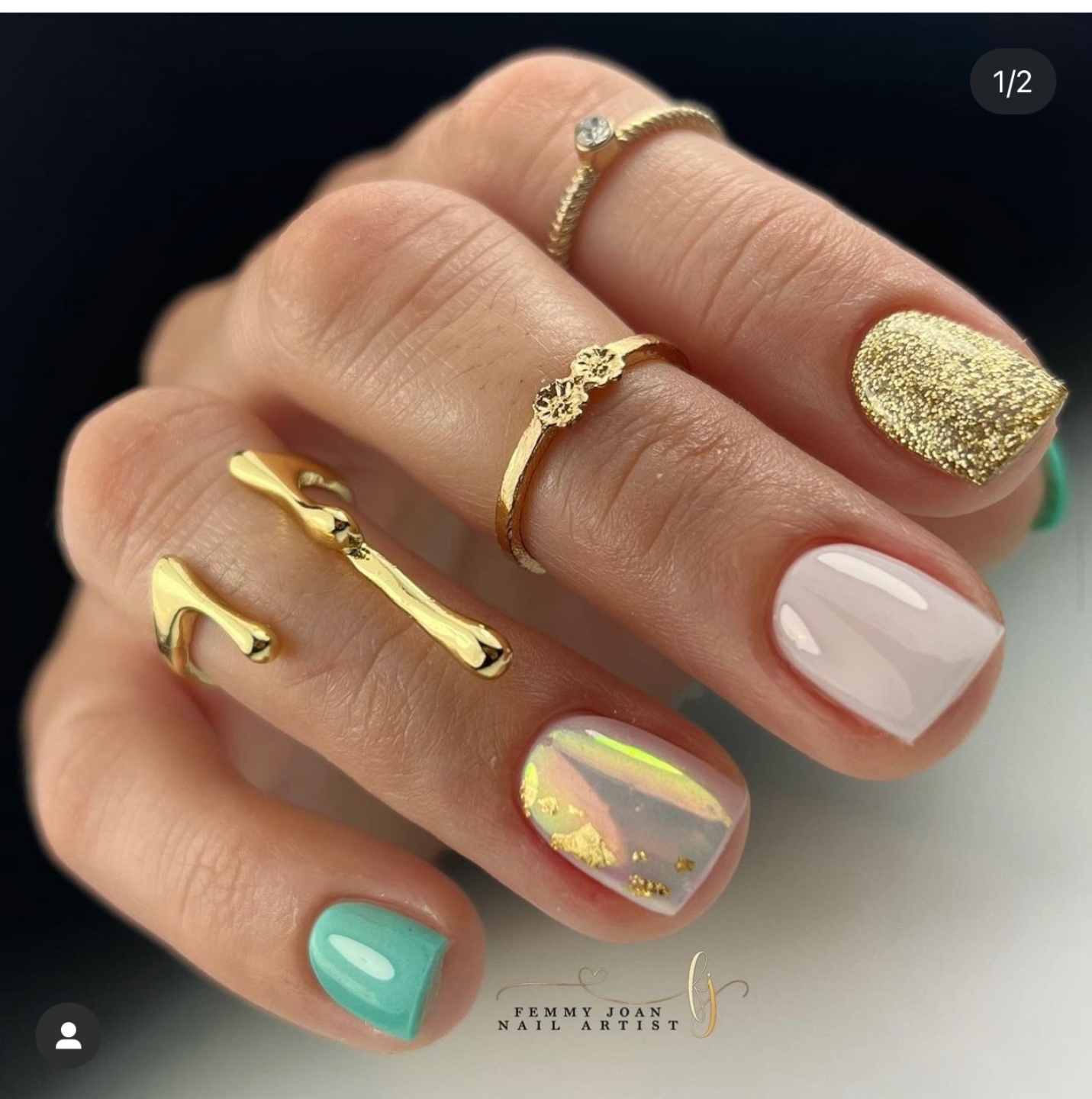 colorful fingernails woman showing her rings and new manicure