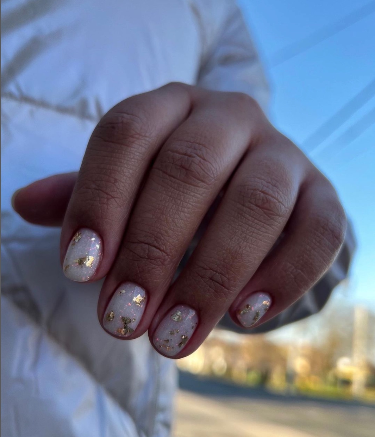 manicure ideas for summer in gold and white Meghan Grant showing manicure ideas for summer in gold and white