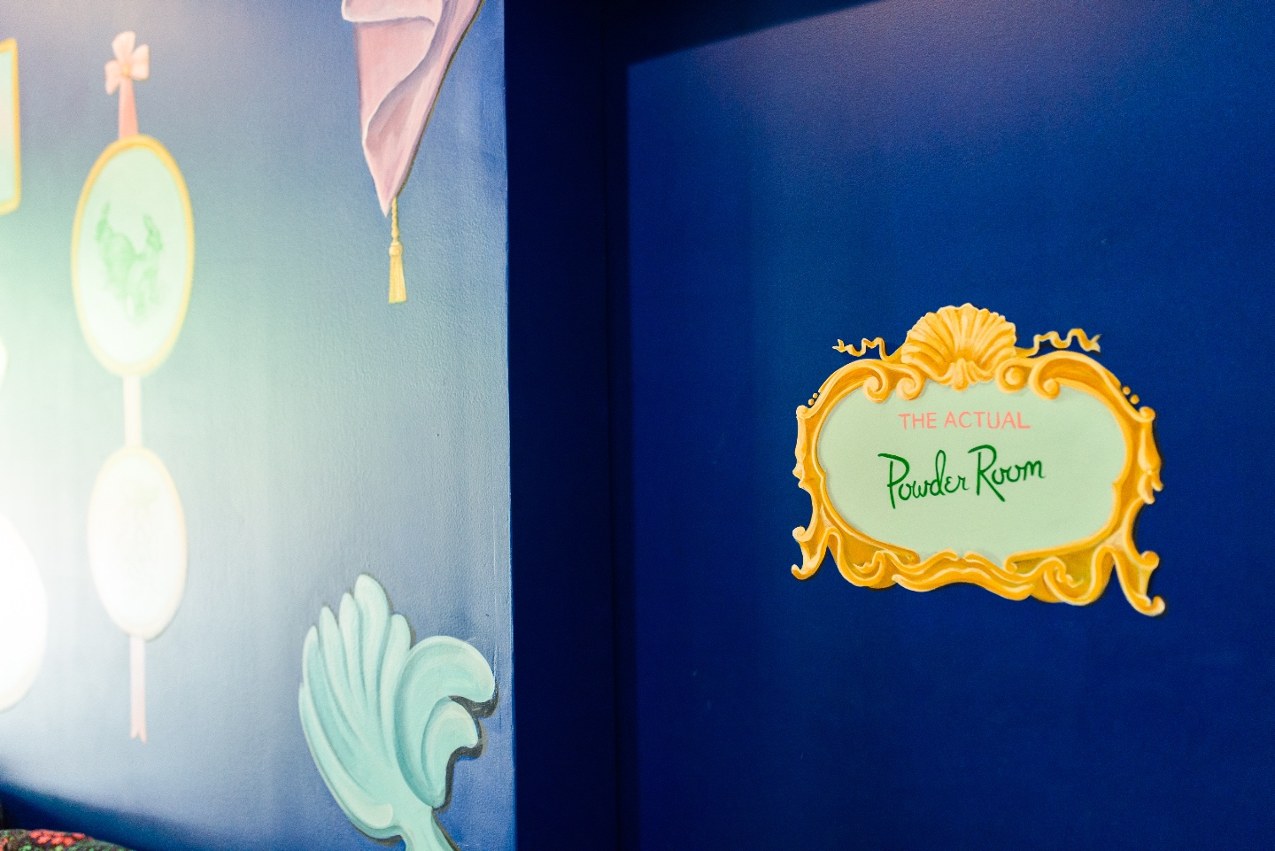 the actual powder room sign