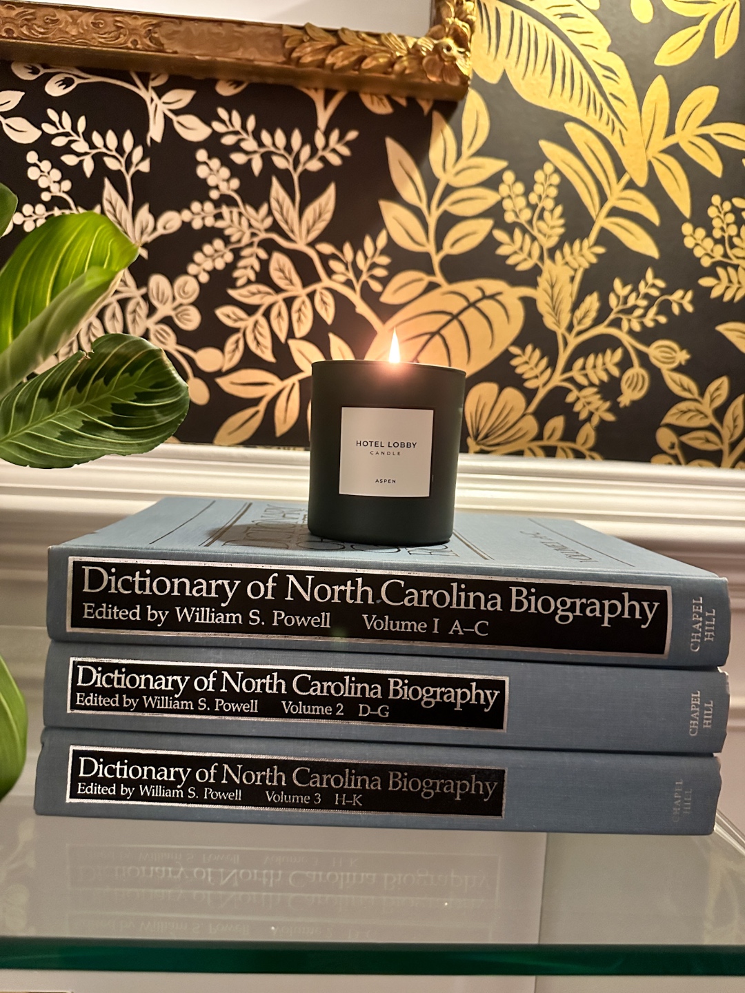 hotel lobby candle stack of books hotel lobby candle on stack of books